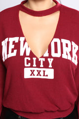 New York City Graphic V Neck Long Sleeve Top in Burgundy